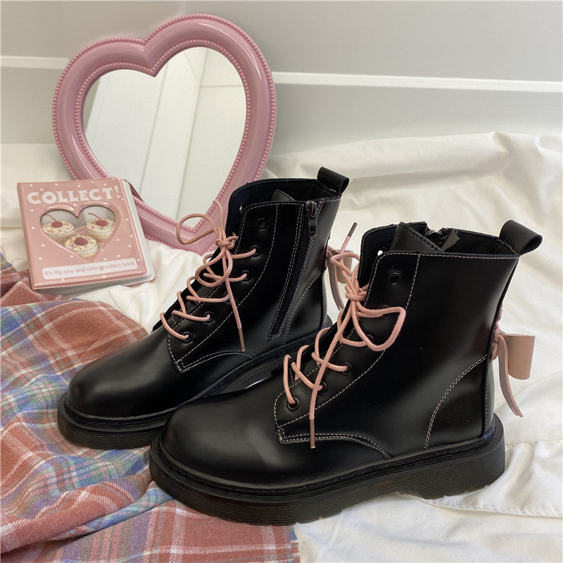 Pink bow Martin boots yv43609