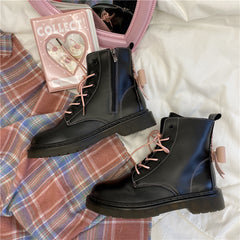 Pink bow Martin boots yv43609